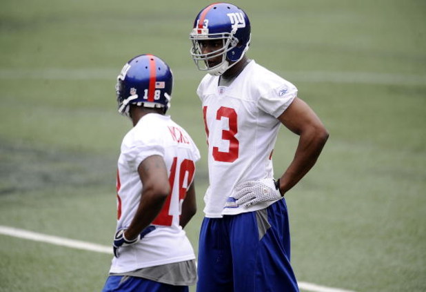 EAST RUTHERFORD, NJ - MAY 09:  Ramses Barden #13 and Hakeem Nicks #18 of the New York Giants works out at rookie camp on May 9, 2009 in East Rutherford, New Jersey.  (Photo by Jeff Zelevansky/Getty Images)