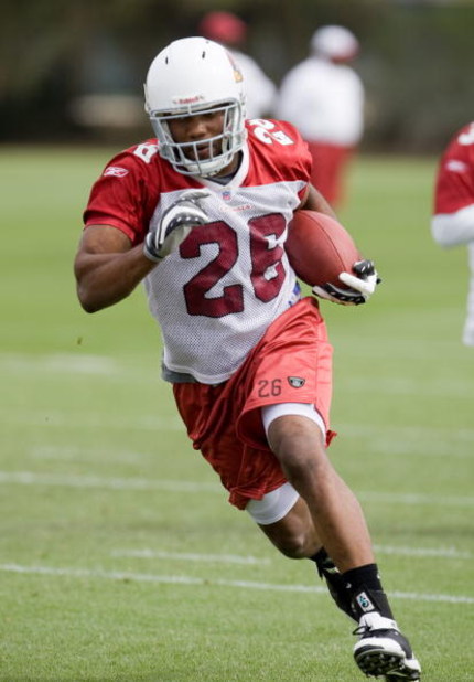 TEMPE, AZ - MAY 1 :  Chris Wells #26 of the Arizona Cardinals runs during a team minicamp at the team training facility on May 1, 2009 in Tempe, Arizona.  (Photo by Jonathan Willey/Getty Images)