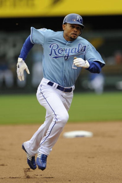 KANSAS CITY, MO - APRIL 30:  Coco Crisp #2 of the Kansas City Royals runs to third base with a triple in the first inning against the Toronto Blue Jays on April 30, 2009 at Kauffman Stadium in Kansas City, Missouri. (Photo by G. Newman Lowrance/Getty Imag
