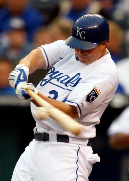 KANSAS CITY, MO - MAY 05:  Mark Teahen #24 of the Kansas City Royals connects during the first inning against the Chicago White Sox on May 5, 2009 at Kauffman Stadium in Kansas City, Missouri.  (Photo by Jamie Squire/Getty Images)
