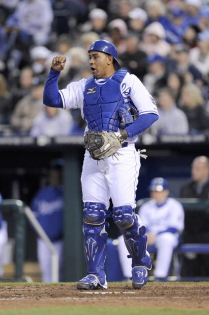 KANSAS CITY, MO - APRIL 11:  Catcher Miguel Olivo #21 of the Kansas City Royals reacts against the New York Yankees on April 11, 2009 at Kauffman Stadium in Kansas City, Missouri. (Photo by G. Newman Lowrance/Getty Images)