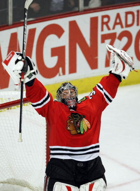 CHICAGO - MAY 11:  Goalie Nikolai Khabibulin #39 of the Chicago Blackhawks celebrates after the Blackhawks won 7-5 against the Vancouver Canucks during Game Six of the Western Conference Semifinal Round of the 2009 Stanley Cup Playoffs on May 11, 2009 at 