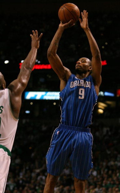 BOSTON - MAY 12:  Rashard Lewis #9 of the Orlando Magic takes a shot as Glen Davis #11 of the Boston Celtics defends in Game Five of the Eastern Conference Semifinals during the 2009 NBA Playoffs at TD Banknorth Garden May 12, 2009 in Boston, Massachusett