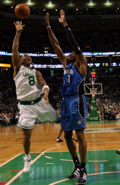BOSTON - MAY 12:  Stephon Marbury #8 of the Boston Celtics takes a shot over Dwight Howard #12 of the Orlando Magic in Game Five of the Eastern Conference Semifinals during the 2009 NBA Playoffs at TD Banknorth Garden May 12, 2009 in Boston, Massachusetts