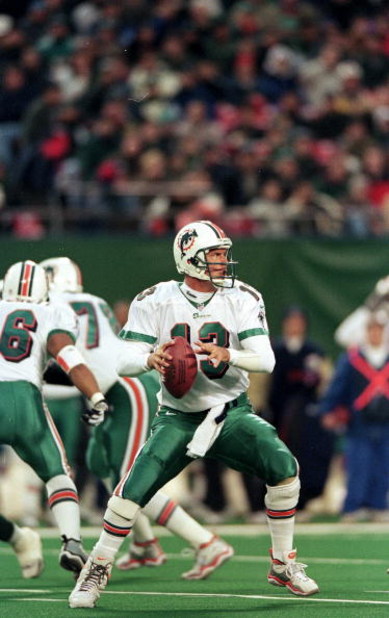 12 Dec 1999:  Dan Marino #13 of the Miami Dolphins gets ready to pass the ball during the game against the New York Jets at the Meadowlands in East Rutherford, New Jersey. The Jets defeated the Dolphins 28-20. Mandatory Credit: Al Bello  /Allsport