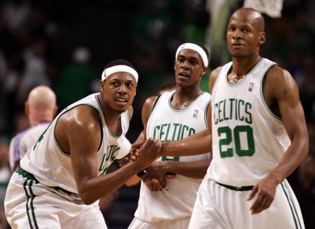 BOSTON - MAY 20:  Paul Pierce #34, Rajon Rondo #9 and Ray Allen #20 of the Boston Celtics look on against the Detroit Pistons during Game One of the 2008 NBA Eastern Conference finals at the TD Banknorth Garden on May 20, 2008 in Boston, Massachusetts. NO