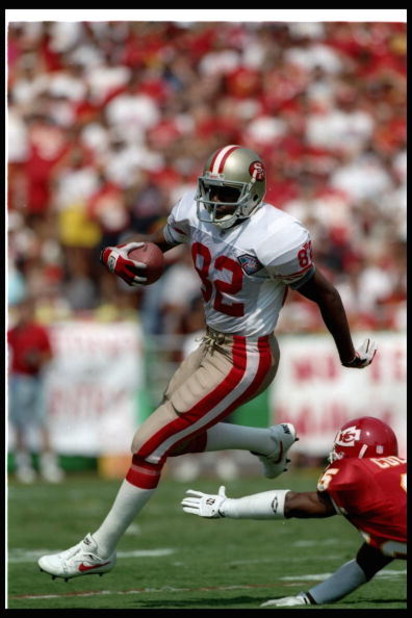 11 Sep 1994:  Wide receiver John Taylor of the San Francisco 49ers runs with the ball during a game against the Kansas City Chiefs at Arrowhead Stadium in Kansas City, Missouri.  The Chiefs won the game, 24-17. Mandatory Credit: Mike Powell  /Allsport