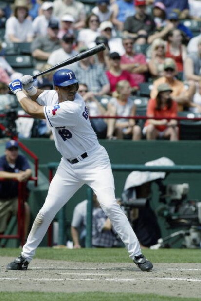ARLINGTON, TX - MAY 11: Juan Gonzalez #19 of the Texas Rangers stands at bat during the game against the Cleveland Indians at the Ballpark in Arlington on May 11, 2003 in Arlington, Texas. The Rangers defeated the Indians 17-10. (Photo by Ronald Martin
