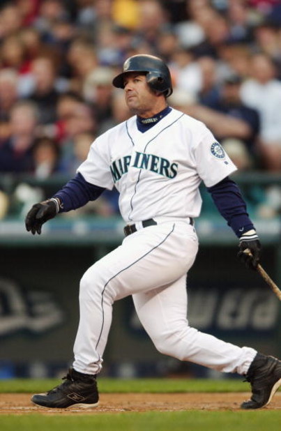 SEATTLE - MAY 6:  Edgar Martinez #11 of the Seattle Mariners hits the ball during the game against the New York Yankees at Safeco Field on May 6, 2003 in Seattle, Washington.  The Mariners won 12-7.  (Photo by Otto Greule/Getty Images) 