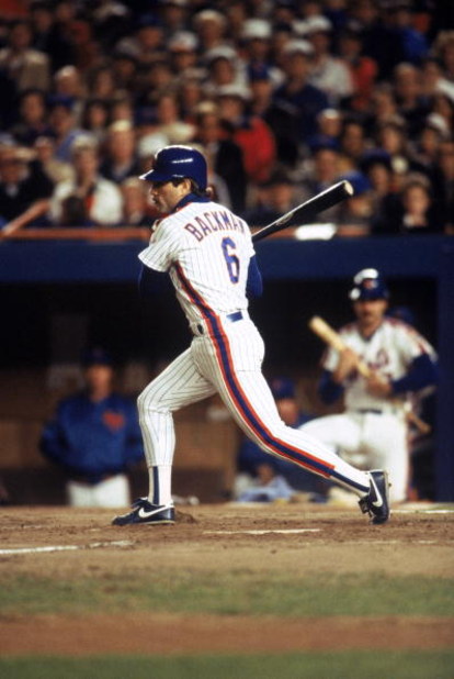 FLUSHING, NY - OCTOBER 27:  Wally Backman #6 of the New York Mets follows through on his swing during Game7 of the1986 World Series against the Boston Red Sox at Shea Stadium on October 27, 1986 in Flushing, New York.  The Mets won the game 8-5 to win the