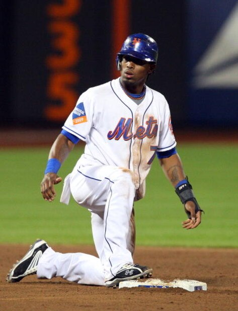 NEW YORK - MAY 12: Jose Reyes #7 of the New York Mets is safe at second base against the Atlanta Braves on May 12, 2009 at Citi Field in the Flushing neighborhood of the Queens borough of New York City. The Mets defeated the Braves 4-3 in ten innings. (
