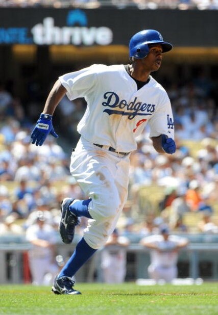 LOS ANGELES, CA - MAY 03: Juan Pierre #9 of the Los Angeles Dodgers runs to first against the San Diego Padres at Dodger Stadium on May 3, 2009 in Los Angeles, California. (Photo by Harry How/Getty Images)