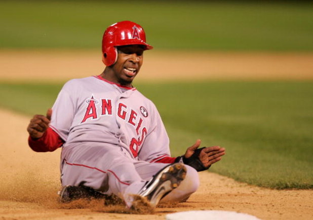 OAKLAND, CA - MAY 04:  Chone Figgins #9 of the Los Angeles Angels of Anaheim slides in to third base during their game against the Oakland Athletics on May 4, 2009 at the Oakland Coliseum in Oakland, California.  (Photo by Ezra Shaw/Getty Images)