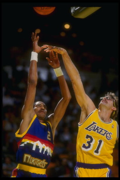 1980''s:  Guard Alex English of the Denver Nuggets shoots the ball during a game versus the Los Angeles Lakers at the Forum in Inglewood, California. Mandatory Credit: Stephen Dunn  /Allsport Mandatory Credit: Stephen Dunn  /Allsport