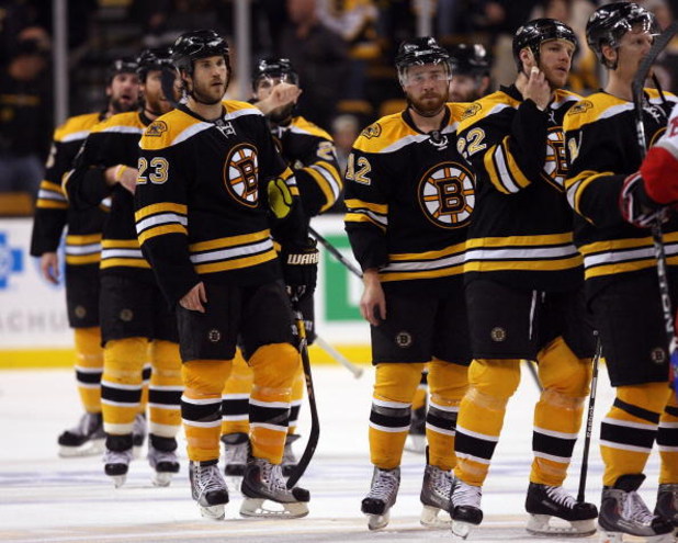 BOSTON - MAY 14:  The Boston Bruins line up to congratulate the Carolina Hurricanes after Game Seven of the Eastern Conference Semifinal Round of the 2009 Stanley Cup Playoffs on May 14, 2009 at the TD Banknorth Garden in Boston, Massachusetts. The Hurric