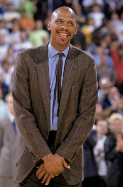 LOS ANGELES - 1989:  NBA Hall of Fame center Kareem Abdul-Jabbar smiles during his jersey retirement at the Great Western Forum in Los Angeles, California in 1989.  (Photo by: Stephen Dunn/Getty Images)
