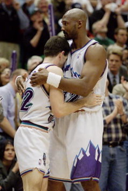 21 Apr 2001:  Karl Malone #32 gives John Stockton #12 of the Utah Jazz a hug after they escaped with an 88-86 win over the Dallas Mavericks during their first round playoff game at the Delta Center in Salt Lake City, Utah.  <DIGITAL IMAGE> Mandatory Credi
