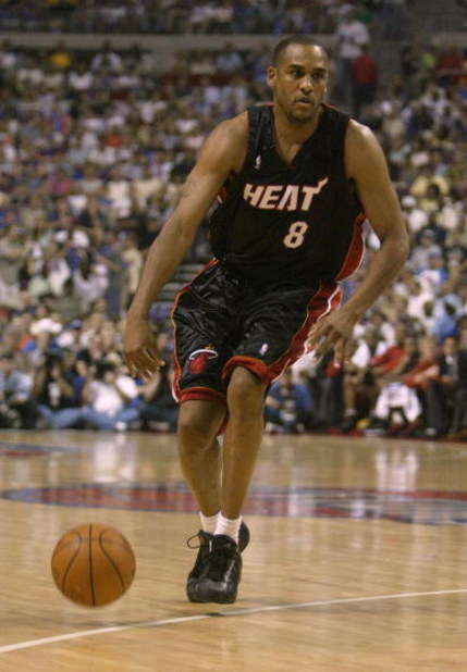 AUBURN HILLS, MI - JUNE 4:  Steve Smith #8 of the Miami Heat drives against the Detroit Pistons in Game Six of the Eastern Conference Finals during the 2005 NBA Playoffs June 4, 2005 at the Palace At Auburn Hills in Auburn Hills, Michigan. The Pistons won