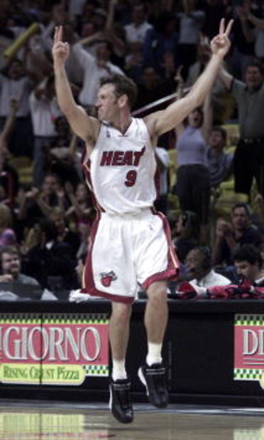 6 Apr 2001: Dan Majerle #9 of the Miami Heat reacts to sinking a 3 pointer in the fourth quarter against the Charlotte Hornets at American Airlines Arena in Miami, Florida. The Heat won 81-76.  DIGITAL IMAGE Mandatory Credit: Eliot Schechter/ALLSPORT  NOT