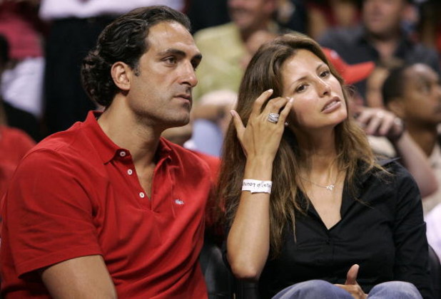MIAMI - JUNE 6:  Former NBA player Rony Seikaly and Sports Illustrated Swim Suit cover model Elsa Benitez attend Game Seven of the Eastern Conference Finals between the Detroit Pistons and the Miami Heat during the 2005 NBA Playoffs June 6, 2005 at the Am