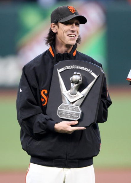 SAN FRANCISCO - APRIL 08: Pitcher Tim Lincecum #55 of the San Francisco Giants celebrates after receiving his 2008 Cy Young award before his game against the Milwaukee Brewers at a Major League Baseball game on April 8, 2009 at AT&T Park in San Francisco