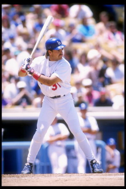 2 Jul 1995:  Catcher Mike Piazza of the Los Angeles Dodgers at bat during a game against the Colorado Rockies at Dodger Stadium in Los Angeles, California.  The Rockies won the game 10-1. Mandatory Credit: Stephen Dunn  /Allsport