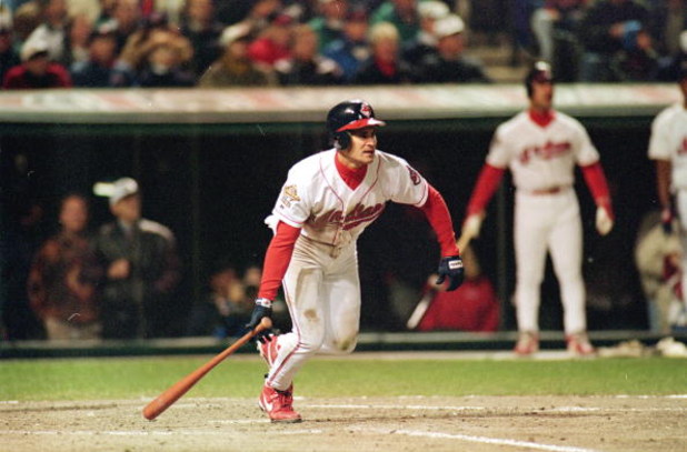 24 Oct 1995:  Omar Vizquel of the Cleveland Indians starts to run after hitting the ball during game three of the World Series against the Atlanta Braves at Jacob's Field in Cleveland, Ohio. The Indians defeated the Braves 7-6. Mandatory Credit: Otto Greu