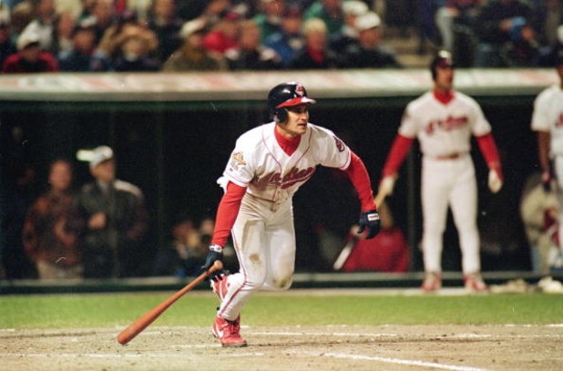 24 Oct 1995: Omar Vizquel of the Cleveland Indians starts to run after hitting the ball during game three of the World Series against the Atlanta Braves at Jacob's Field in Cleveland, Ohio. The Indians defeated the Braves 7-6. Mandatory Credit: Otto Greu