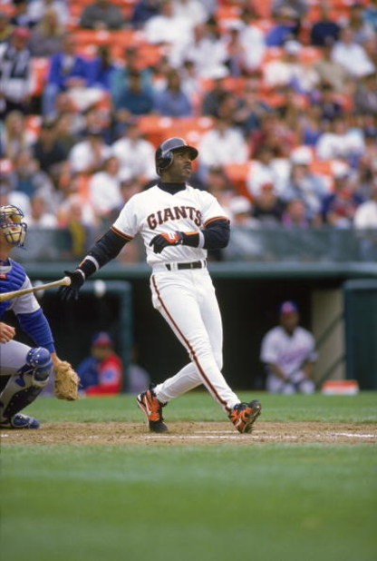 SAN FRANCISCO - MAY 17:  Barry Bonds #25 of the San Francisco Giants hits a home run against the Chicago Cubs in the 7th inning on May 17, 1995 at Candlestick Park in San Francisco, California. Barry Bonds made his 262nd career home run during this game. 