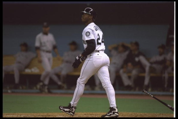 7 Oct 1995: Ken Griffey Jr. of the Seattle Mariners follows his home run as he goes to base during the game against the New York Yankees in the American League Divisional Playoff at the King Dome in Seattle, Wahington.. The Mariners clinched the series b