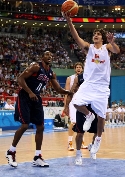 BEIJING - AUGUST 24:  Ricky Rubio #6 of Spain lays the ball up past Dwight Howard #11 of the United States in the gold medal game during Day 16 of the Beijing 2008 Olympic Games at the Beijing Olympic Basketball Gymnasium on August 24, 2008 in Beijing, Ch