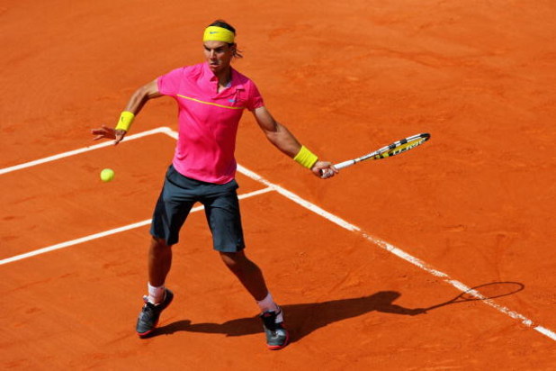 PARIS - MAY 25:  Rafael Nadal of Spain hits a forehand during his Men's Singles First Round match against Marcos Daniel of Brazil at the French Open at Roland Garros on May 25, 2009 in Paris, France.  (Photo by Matthew Stockman/Getty Images)