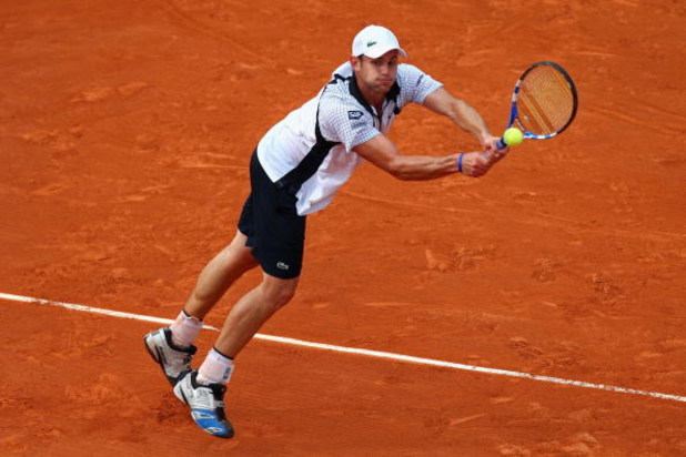 PARIS - MAY 25:  Andy Roddick of USA hits a backhand during his Men's Singles First Round match against Romain Jouan of France at the French Open on May 25, 2009 in Paris, France.  (Photo by Ryan Pierse/Getty Images)