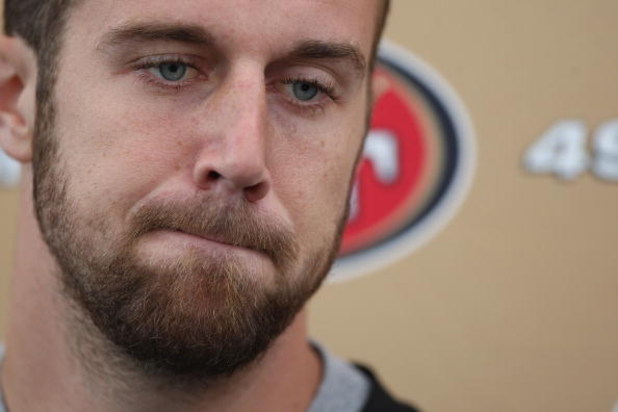 SANTA CLARA, CA - MAY 01:  Quarterback Alex Smith #11 of the San Francisco 49ers talks with the media during the 49ers Minicamp at their training facilities on May 1, 2009 in Santa Clara, California.  (Photo by Jed Jacobsohn/Getty Images)