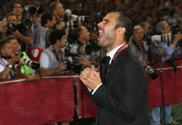 ROME - MAY 27: Josep Guardiola coach of Barcelona celebrates after Barcelona won 2-0 during the UEFA Champions League Final match between Barcelona and Manchester United at the Stadio Olimpico on May 27, 2009 in Rome, Italy.  (Photo by Alex Livesey/Getty 