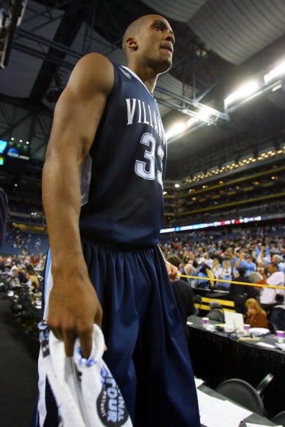 DETROIT - APRIL 04:  Dante Cunningham #33 of the Villanova Wildcats walks off the court after losing to the North Carolina Tar Heels 83-69 during the National Semifinal game of the NCAA Division I Men's Basketball Championship at Ford Field on April 4, 20