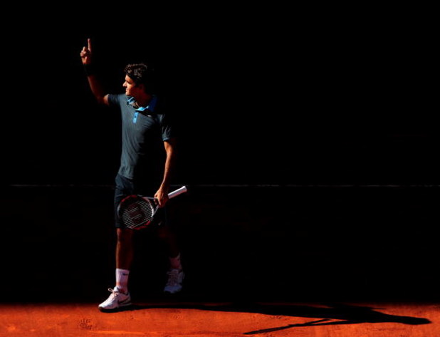 MADRID, SPAIN - MAY 17:  Roger Federer of Switzerland celebrates his win over Rafael Nadal of Spain during the final of the Madrid Open tennis tournament at the Caja Magica on May 17, 2009 in Madrid, Spain. Federer won the match in two sets, 6-4 and 6-4. 