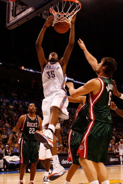 OKLAHOMA CITY - OCTOBER 29:  Kevin Durant #35 of the Oklahoma City Thunder dunks the ball over Andrew Bogut #6 of the Milwaukee Bucks at the Ford Center October 29, 2008 in Oklahoma City, Oklahoma. The Bucks defeated the Thunder 98-87.  NOTE TO USER: User