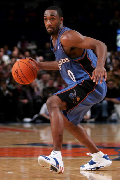 NEW YORK - DECEMBER 06:  Gilbert Arenas #0 of the Washington Wizards looks to pass against the New York Knicks on December 06, 2006 at Madison Square Garden in New York City. NOTE TO USER: User expressly acknowledges and agrees that, by downloading and or