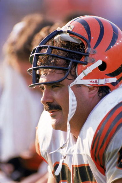 LOS ANGELES - NOVEMBER 5:  Guard Max Montoya #65 of the Cincinnati Bengals takes a rest on the sidelines during a game against the Los Angeles Raiders at the Los Angeles Memorial Coliseum on November 5, 1989 in Los Angeles, California.  Montoya is in his 