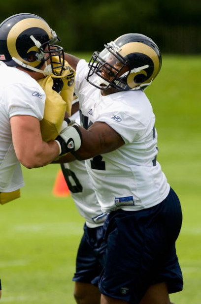 EARTH CITY, MO - MAY 2: Jason Smith #77 of the St. Louis Rams looks on during a mini camp on May 2, 2009 at the Russell Training Center in Earth City, Missouri.  (Dilip Vishwanat/Getty Images)