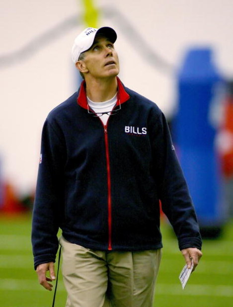 ORCHARD PARK, NY - MAY 01: Dick Jauron, head coach of the Buffalo Bills looks up to a video basket during Buffalo Bills Minicamp at Buffalo Bills Fieldhouse on May 1, 2009 in Orchard Park, New York.  (Photo by Rick Stewart/Getty Images)