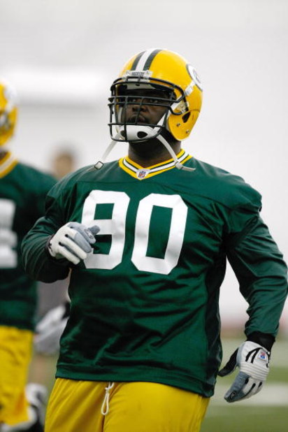 GREEN BAY, WI - MAY 1:  Defensive lineman B.J. Raji #90 runs as he participates in practice drills during Green Bay Packers Minicamp at Don Hutson Center on May 1, 2009 in Green Bay, Wisconsin. (Photo by Scott Boehm/Getty Images)