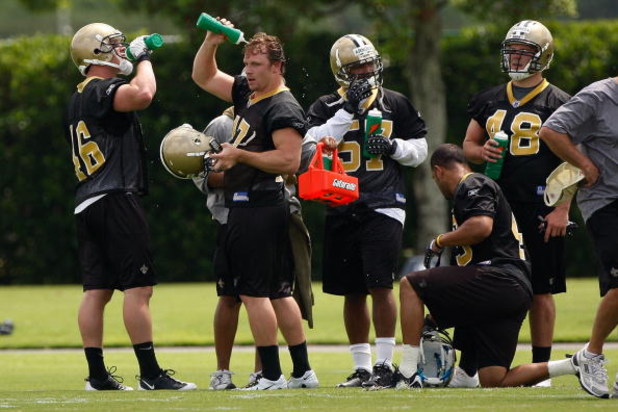 METAIRIE, LA - MAY 08:  Members of the New Orleans Saints take a break to cool off in the heat during the Rookie Minicamp at the New Orleans Saints Training Facility on May 8, 2009 in Metairie, Louisiana.  (Photo by Chris Graythen/Getty Images)