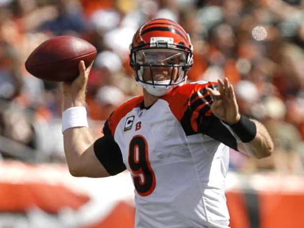 CINCINNATI - SEPTEMBER 14:  Carson Palmer #9 of the Cincinnati Bengals throws the ball against the Tennessee Titans during the first quarter of their NFL game September 14, 2008 at Paul Brown Stadium in Cincinnati, Ohio.  (Photo by Matt Sullivan/Getty Ima