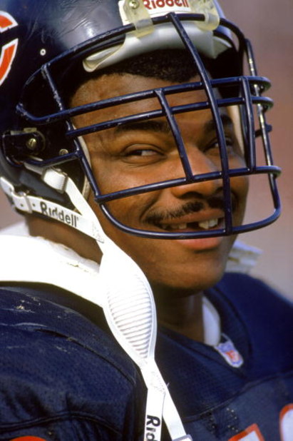 CHICAGO - SEPTEMBER 18:  William Perry #72 of the Chicago Bears looks on during a game against the Tampa Bay Buccaneers at Soldier Field on September 18, 1992 in Chicago, Illinois.  The Bears won 31-14.  (Photo by Jonathan Daniel/Getty Images)