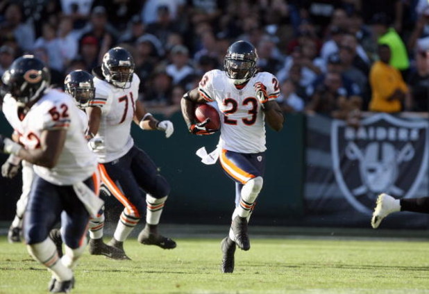 OAKLAND, CA - NOVEMBER 11: Devin Hester #23 of the Chicago Bears carries the kick off return against the Oakland Raiders during an NFL game on November 11, 2007 at McAfee Coliseum in Oakland, California. (Photo by Jed Jacobsohn/Getty Images)