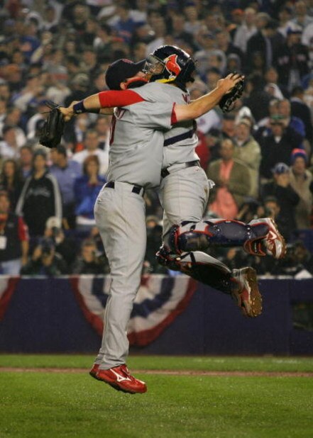 NEW YORK - OCTOBER 19: Adam Wainwright #50 and Yadier Molina #4 of the St. Louis Cardinals celebrate after defeating the New York Mets 3-1 to take game seven of the NLCS at Shea Stadium on October 19, 2006 in the Flushing neighborhood of the Queens borou