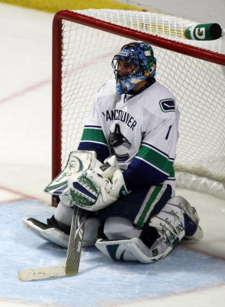 CHICAGO - MAY 11:  Goalie Roberto Luongo #1 of the Vancouver Canucks sits on the ice after he gave up a hat trick goal to Patrick Kane #88 of the Chicago Blackhawks in the third period during Game Six of the Western Conference Semifinal Round of the 2009 