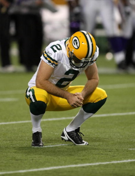 MINNEAPOLIS - NOVEMBER 09:  Kicker Mason Crosby #2 of the Green Bay Packers reacts after missing on a 51 yard field goal attempt to win the game with 31 seconds remaining against the Minnesota Vikings on November 9, 2008 at the Metrodome in Mineapolis, Mi